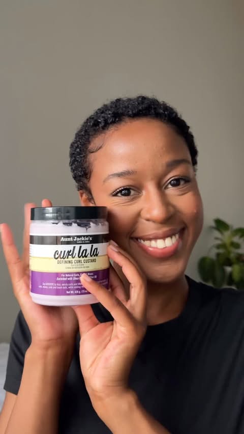 Instagram post by @_iiamrj for Aunt Jackie's Curls & Coils. Caption reads: Curl La La has my curls defined, hydrated, and....