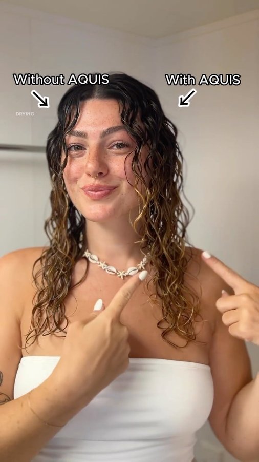 Instagram post by @brittminetti for AQUIS Hair. Caption reads: [...] on vacay 🌴 

ft. the one and only....