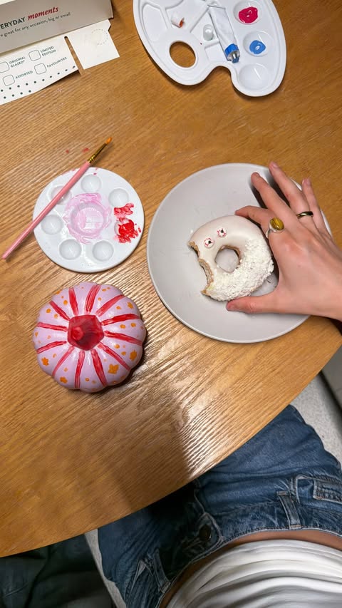 Instagram post by @ava_oetting for Krispy Kreme Doughnuts. Caption reads: The perfect Halloween night with the girls!!....