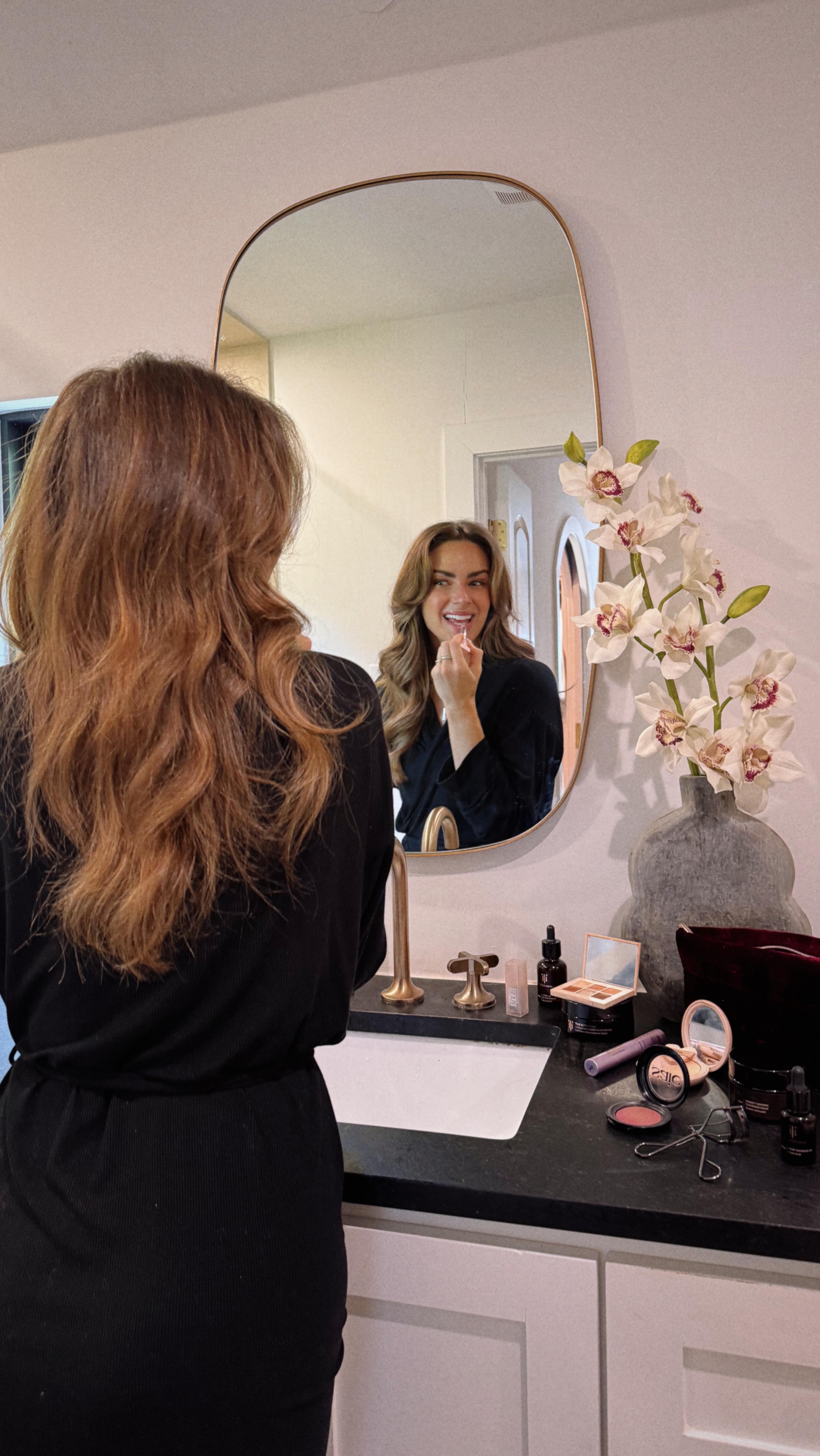 Instagram post by @aloprofile for true Botanicals. Caption reads: GET READY WITH ME for a holiday party while we....