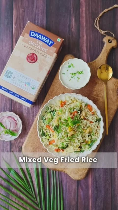 Instagram post by @romisrecipe for Daawat. Caption reads: Mixed Veg Fried Rice X @daawatofficial (New Launch....