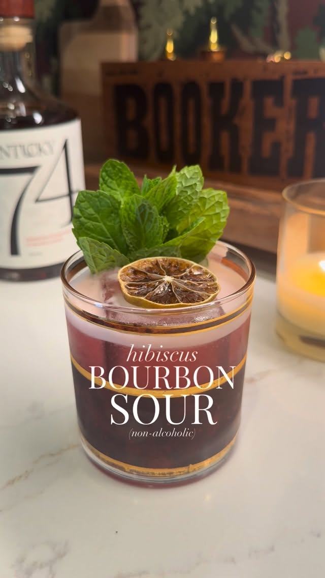 Instagram post by @kentuckyginger for Total Wine & More. Caption reads: HIBISCUS BOURBON SOUR (non-alcoholic) Are you....