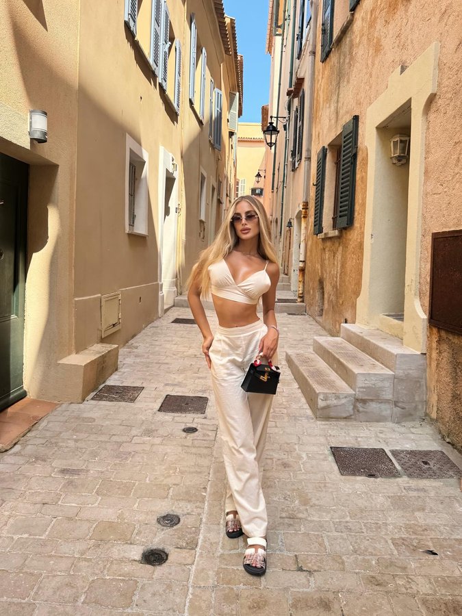 Instagram post by @nicolesimeonex for Missy Empire. Caption reads: In my favorite place on earth wearing @missyempire....