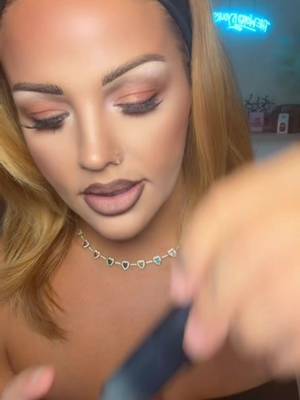 TikTok post by @the_makeup_mami for Glamlite Cosmetics. Caption reads: My favorite lip kit! @Glamlite #halloweenlipkit....