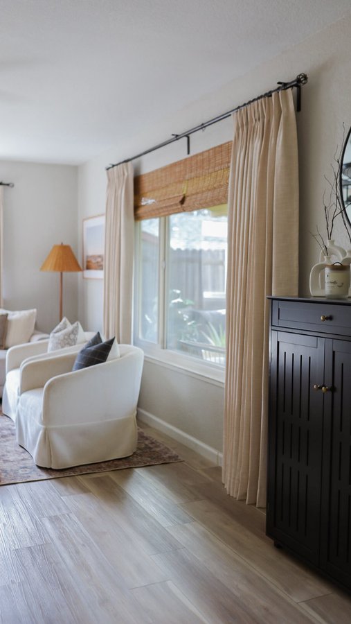 Instagram post by @lualayse for Twopagescurtains. Caption reads: [gifted] Wrapped the living room in a little extra....