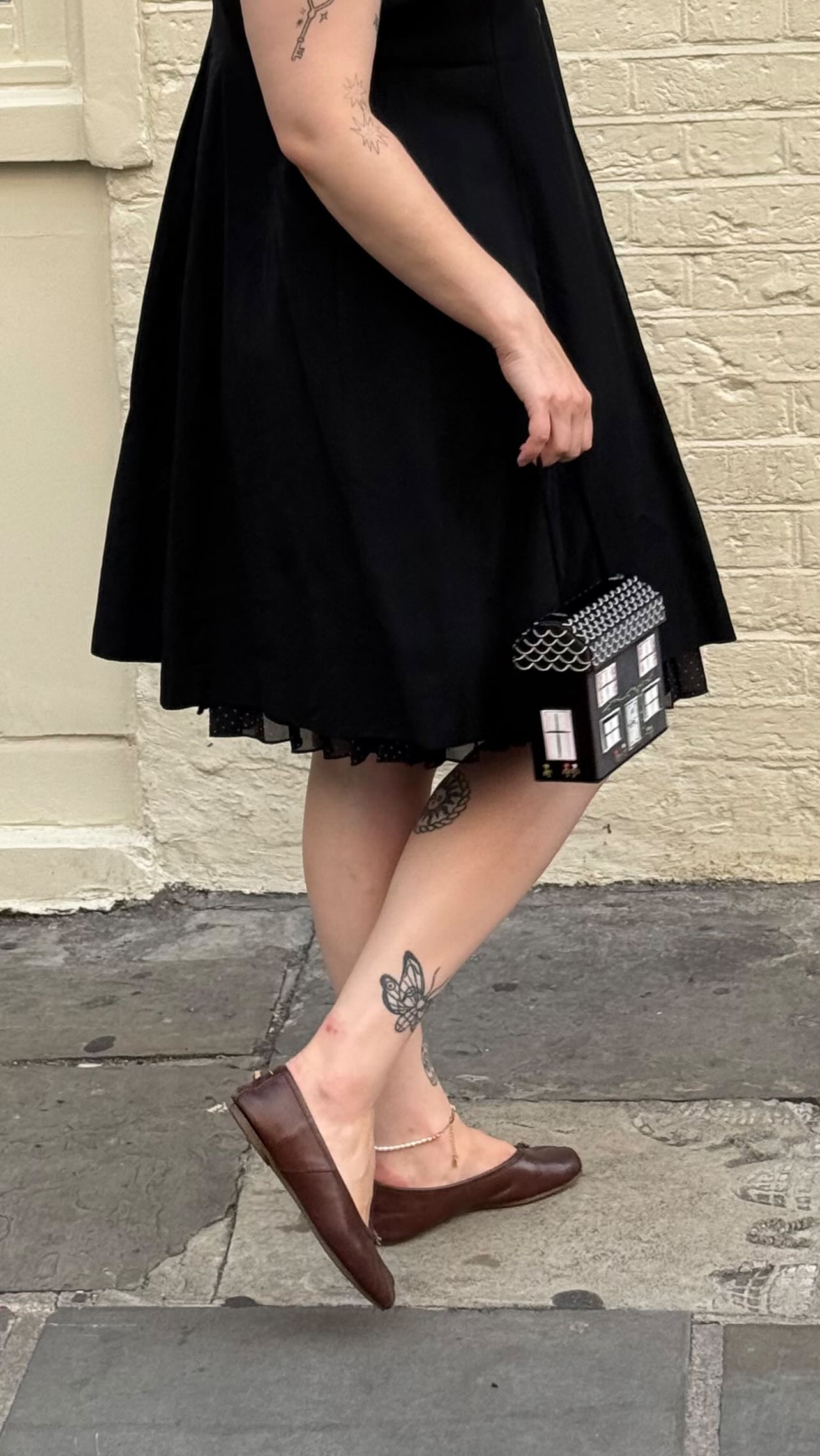 Instagram post by @lucyroseford for Lulu Guinness. Caption reads: something about a simple outfit and fun....