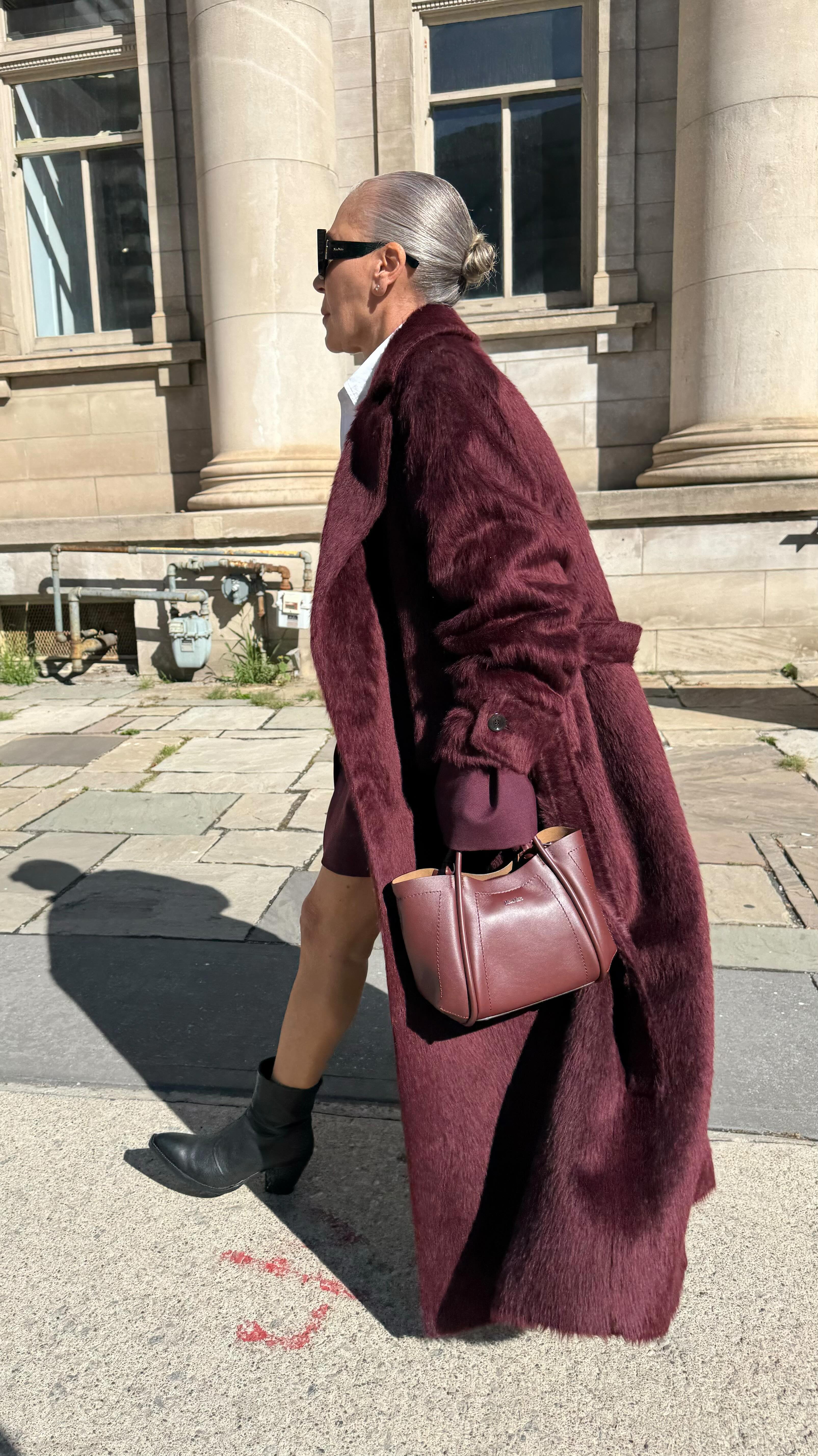 Instagram post by @lisacorbo for Max Mara. Caption reads: coat your way to fashion success @maxmara.