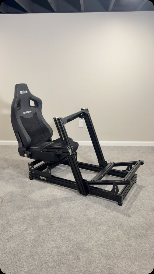 Instagram post by @itsbrettshaffer for Next Level Racing. Caption reads: Just leveled up! New sim rig from Next Level....