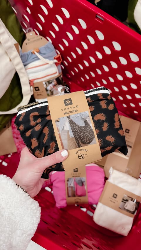 Instagram post by @target_cheer for Thread Wallets. Caption reads: [...] send you the 🔗 ✨ @thread_wallets....