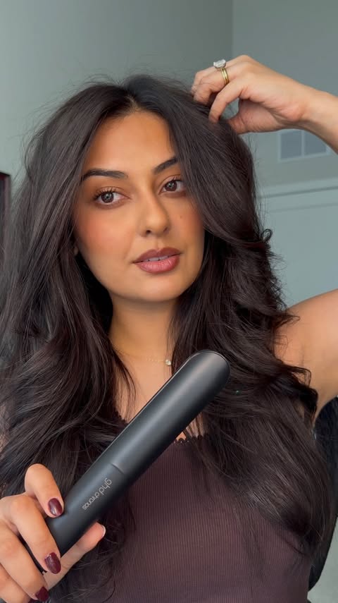 Instagram post by @lookwhoshira for ghd hair. Caption reads: FINALLY figured out how to get these waves and....