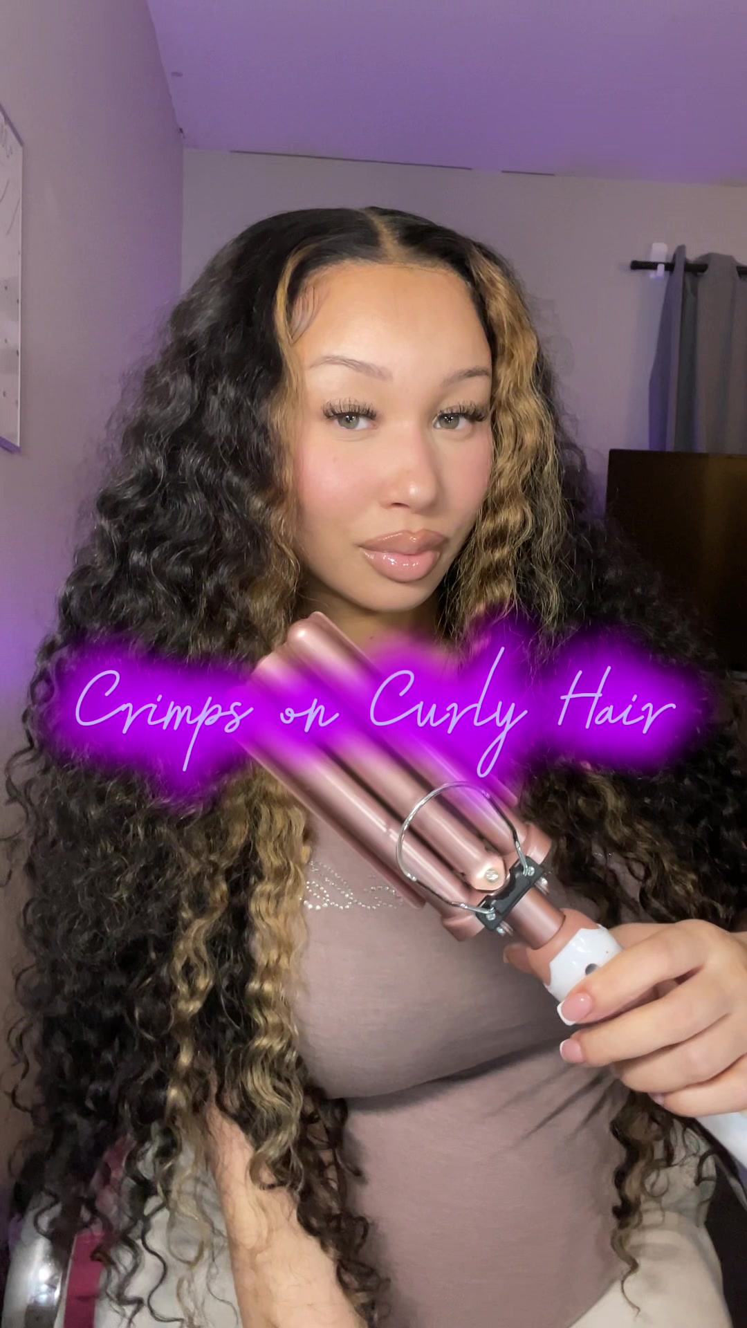 TikTok post by @therealdesmichelle for Amanda Hair. Caption reads: [...] The curls were so soft and voluminous....