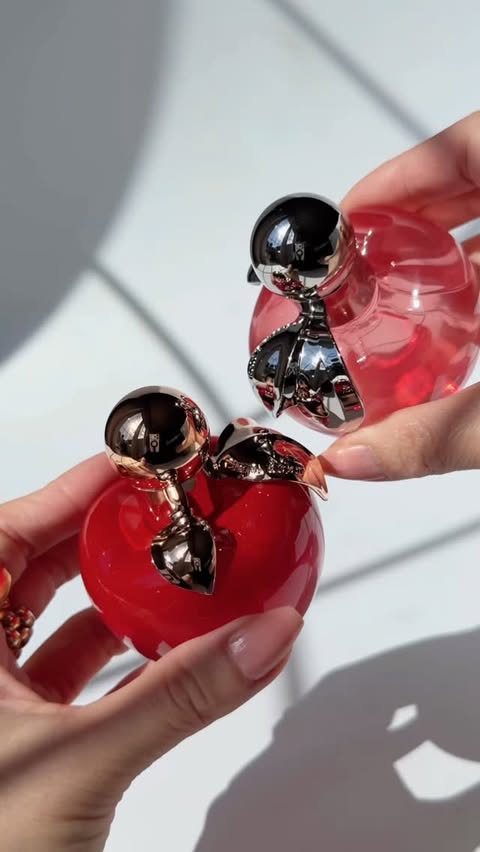 Instagram post by @fromsandyxo for NINA RICCI. Caption reads: [...] prettiest apples I’ve ever seen 🍎 🍎....
