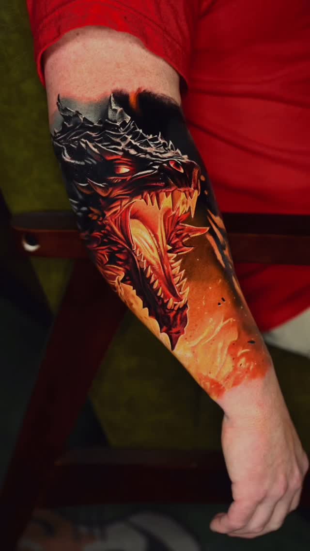 Instagram post by @alexmorotattoo for World Famous Tattoo Ink. Caption reads: Two days, one fire-breathing dragon 🔥

Done with....