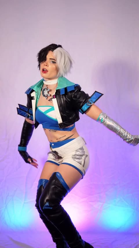 Instagram post by @athena.grimes_ for dokidokicosplay. Caption reads: [...] version ❄️🤍🩵 
.
Cosplay is from....