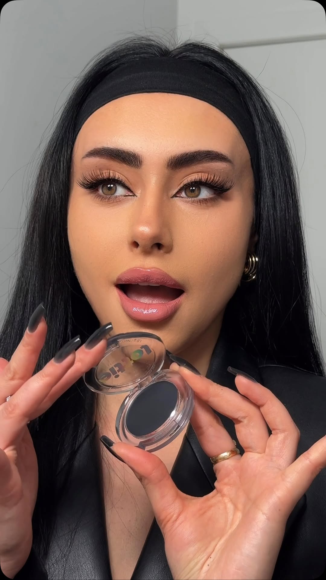 Instagram post by @atosaagha for LottieLondon. Caption reads: Who knew a black blush could be this stunning? 🖤✨....