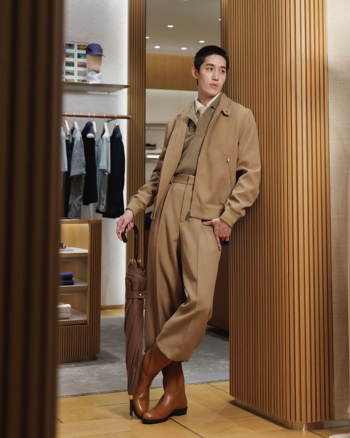 Instagram post by @thanapob_lee for Loro Piana. Caption reads: Warm tone, refined presence 
All excitement in....