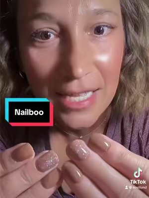 TikTok post by @kostlund for Nailboo. Caption reads: [...] add the perfect touch, don’t you? @Nailboo....