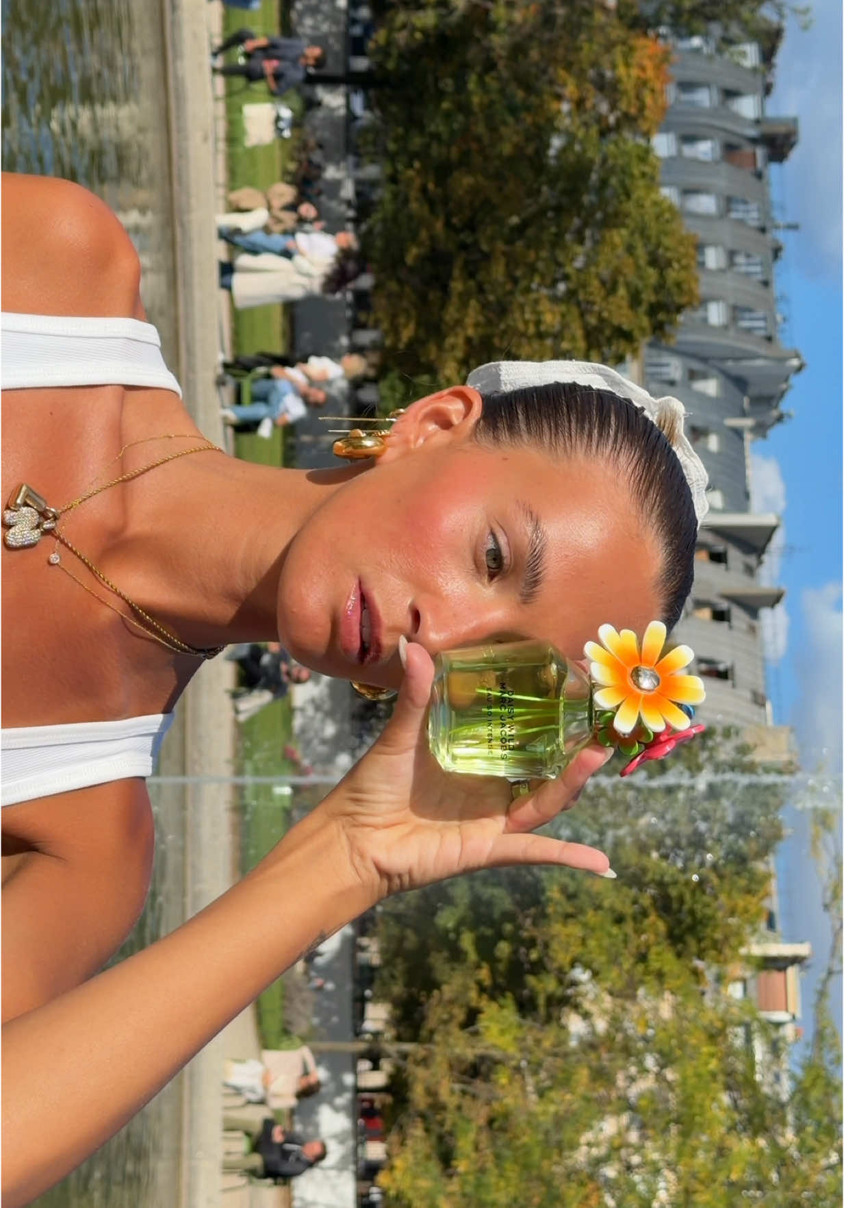 TikTok post by @livvkirbyy for Marc Jacobs Fragrances. Caption reads: Running around Paris with the scent of Marc Jacobs....