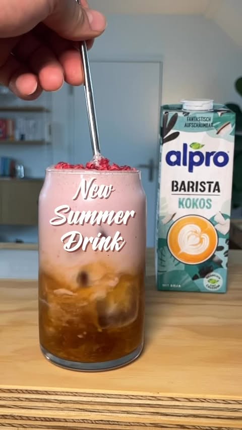 Instagram post by @dariopieber for Alpro. Caption reads: [...] a light raspberry coconut foam made with....
