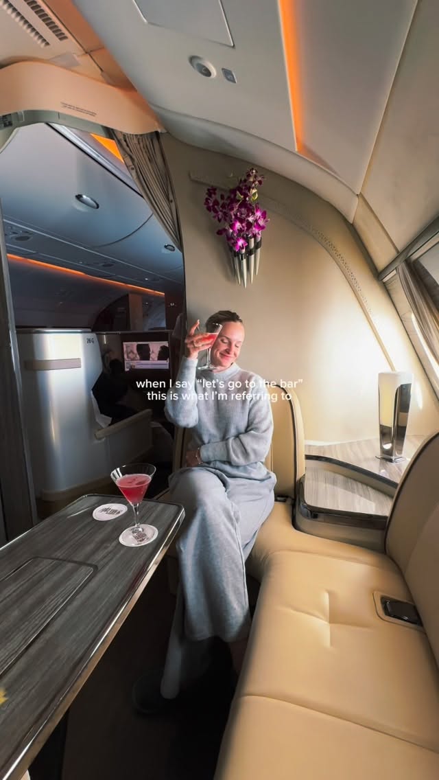 Instagram post by @jennalistontv for Emirates. Caption reads: my standards of “grabbing drinks” have shifted....