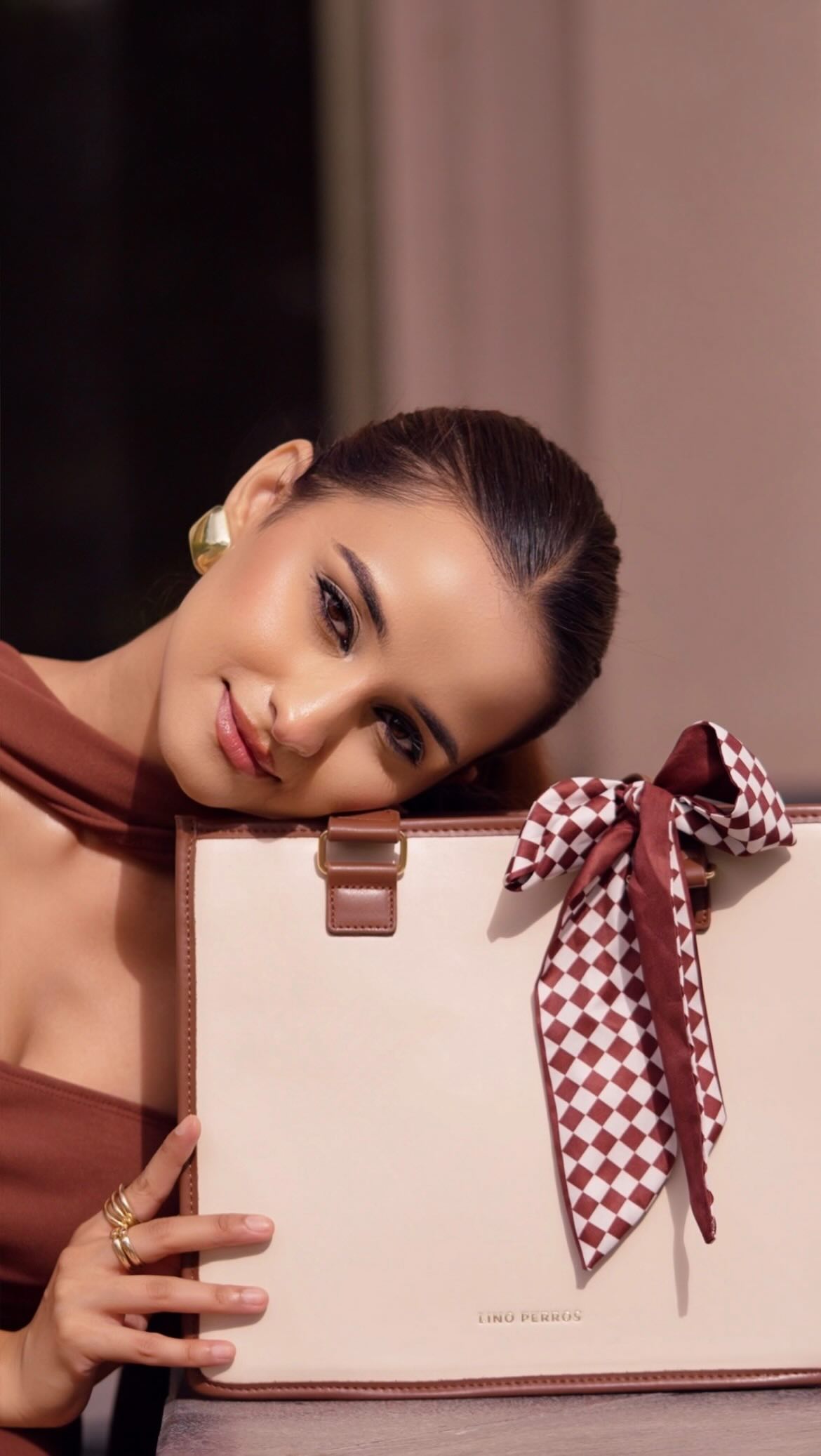 Instagram post by @aayushii_sharmaa_ for Lino Perros. Caption reads: Neutral, structured, unforgettable 💼@linoperros....