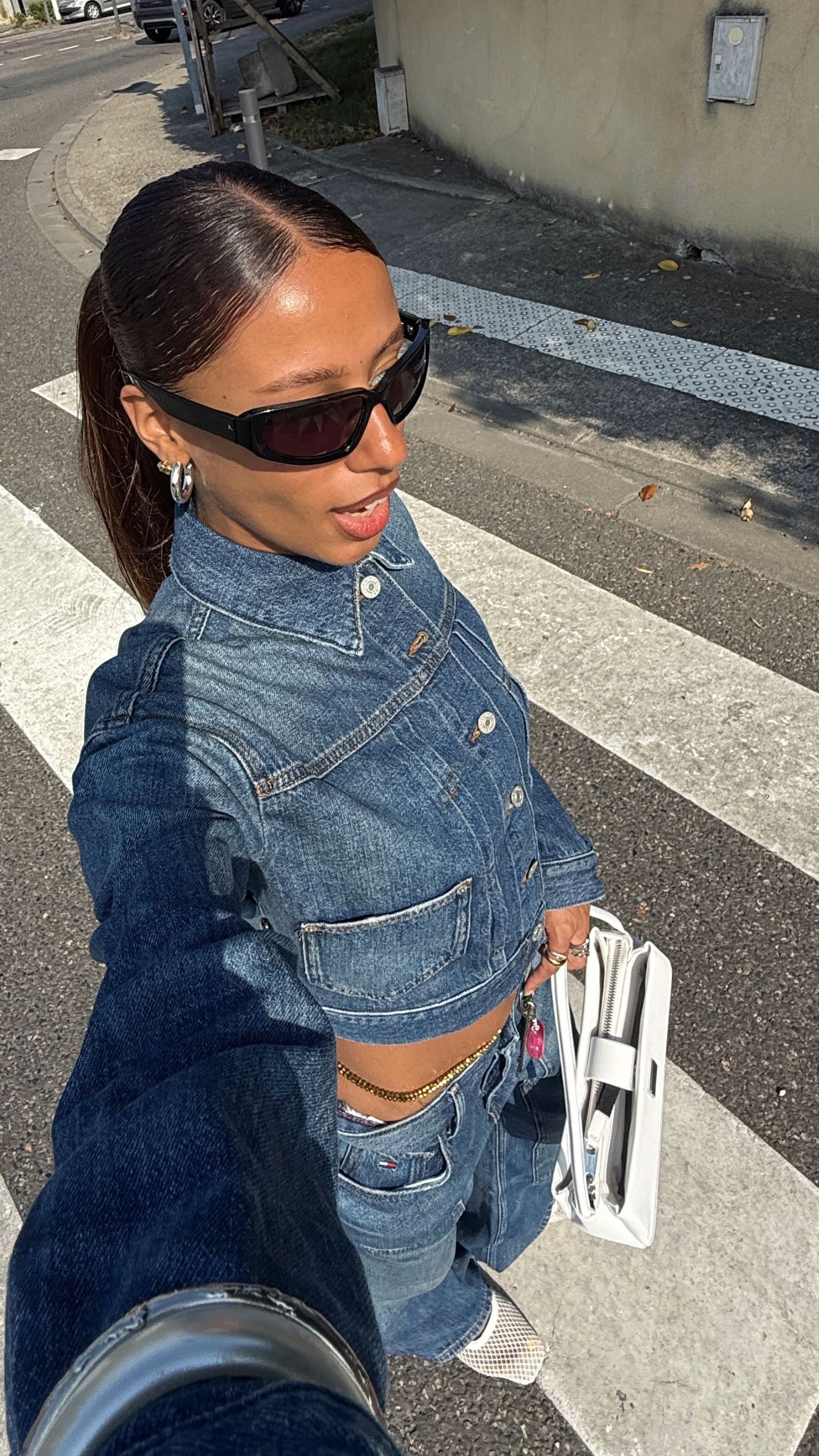 Instagram post by @elisasgn for Tommy Jeans. Caption reads: monday to sunday? we got you covered @elisasgn.