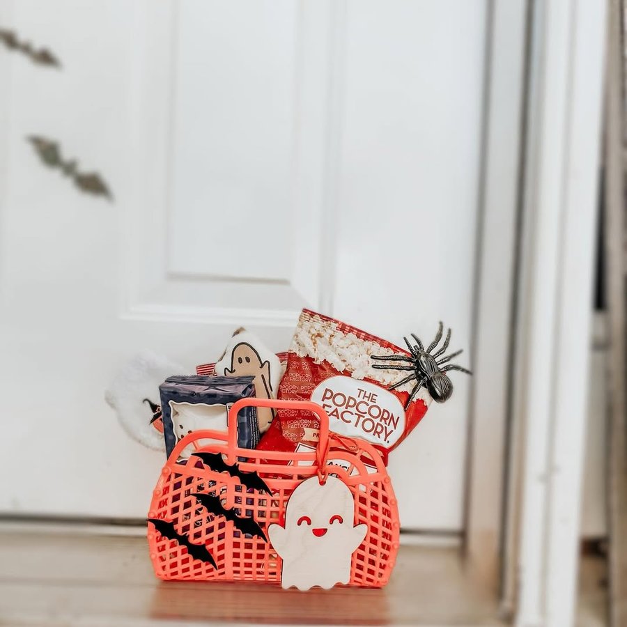 Instagram post by @werethewolffs for The Popcorn Factory. Caption reads: Let’s make an easy Boo Basket with The Popcorn....