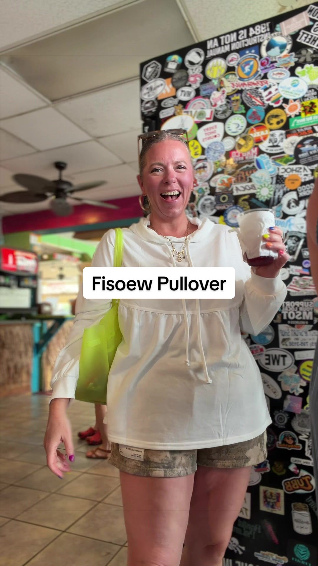 TikTok post by an influencer for Fisoew Clothing Co.. Caption reads: [...] this #pullover from @Fisoew Clothing Co.....