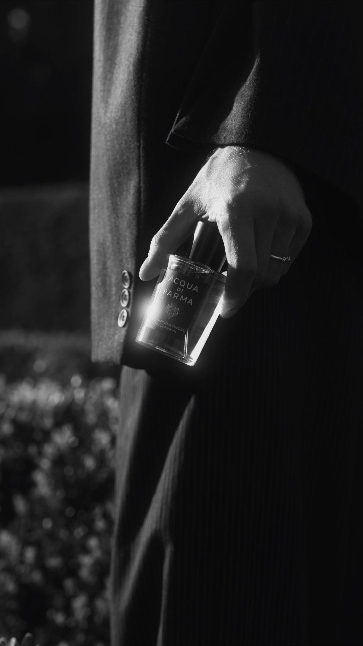 Instagram post by @lukasgold for Acqua di Parma. Caption reads: ad | catching golden hours w/ the new....