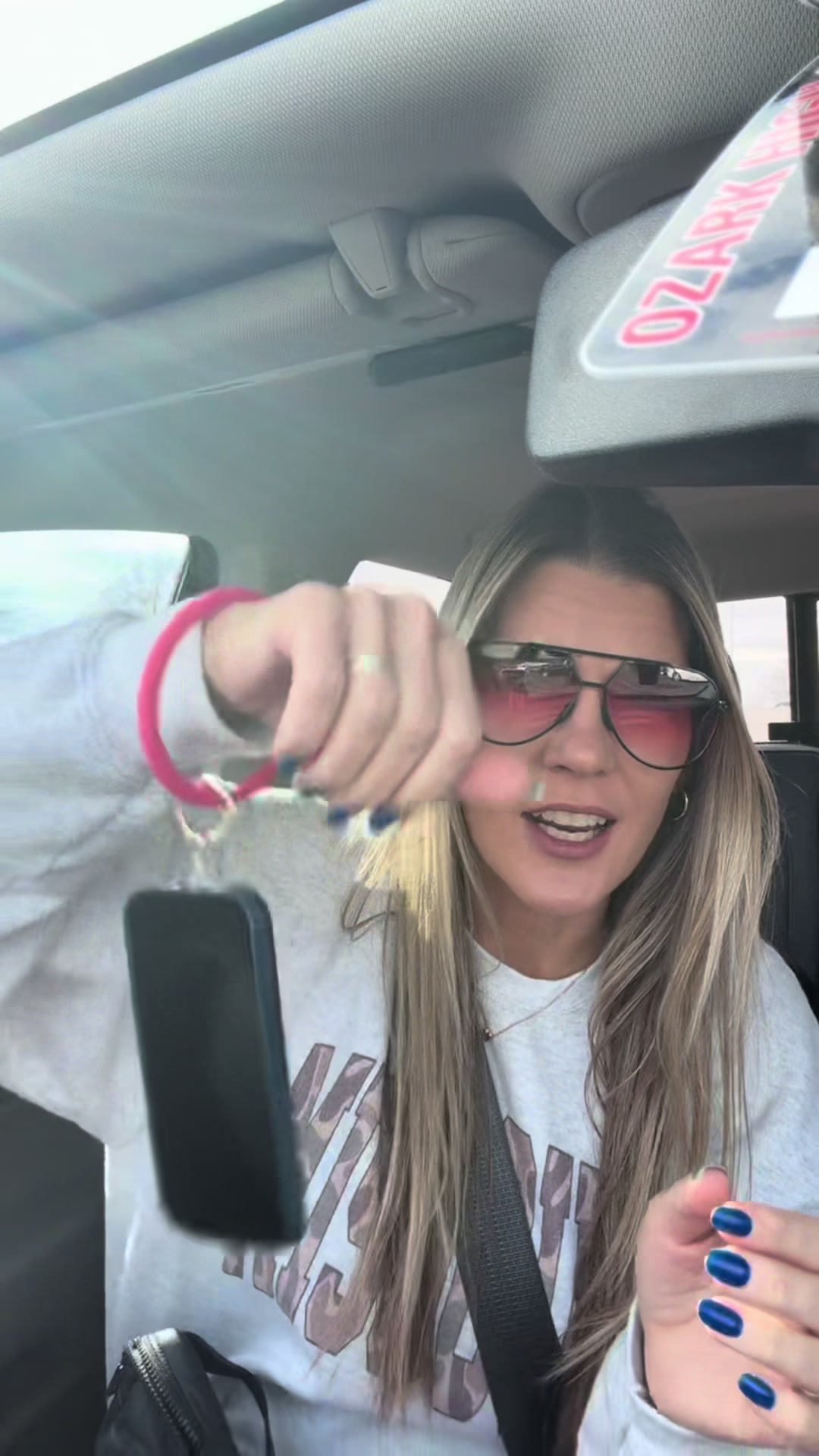 TikTok post by @livinthemomlife for Case-Mate. Caption reads: [...] 🤩 #phoneaccessory #phonebangle #casemate....