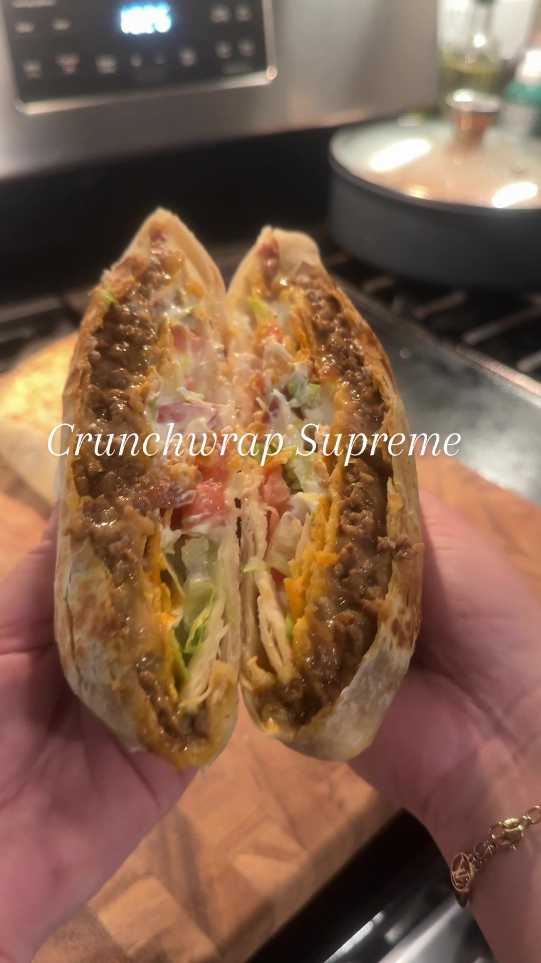 TikTok post by @tastybitesbyb for Taco Bell. Caption reads: Taco Bell inspired Crunchwrap Supreme ~ with [...].