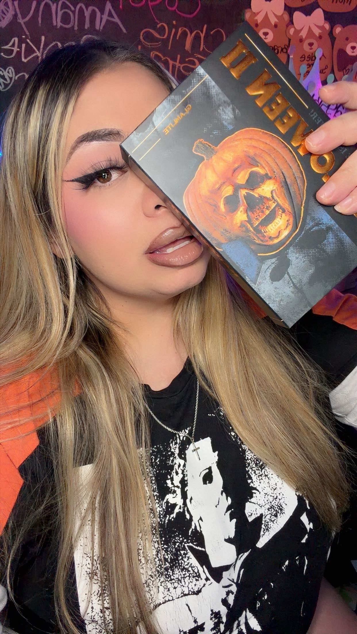 TikTok post by @enjoyrosiee for Glamlite Cosmetics. Caption reads: Spooky Szn is here 🔪🎃!!! @Glamlite bringing back....