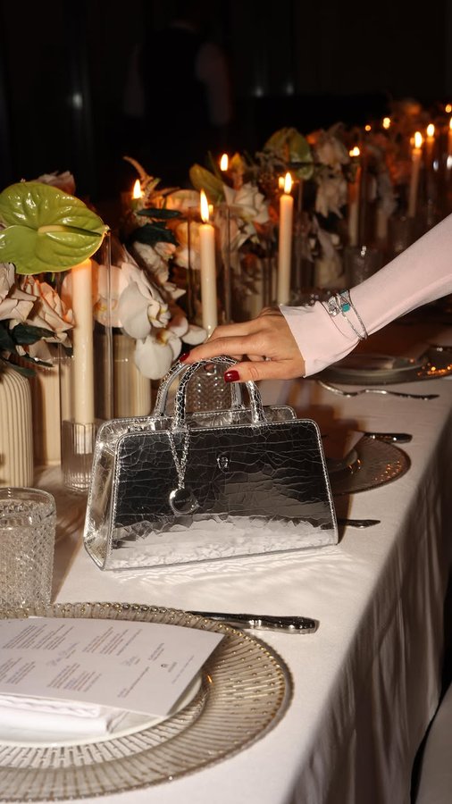 Instagram post by @deemaalasadi for Etienne Aigner AG. Caption reads: A night to remember! ✨ Hosted a beautiful suhoor....