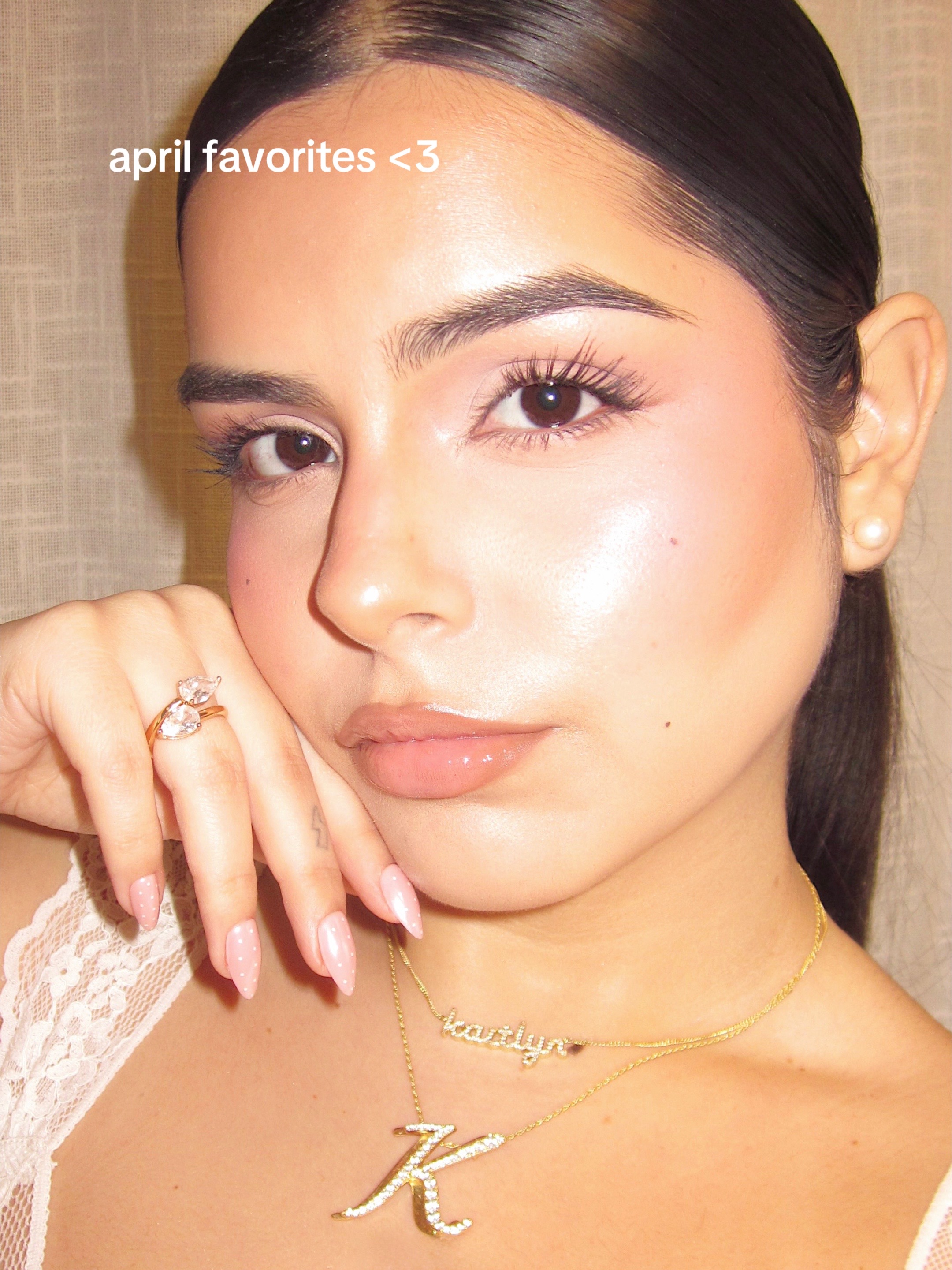 TikTok post by @kaitlynnelston for Emi Jay. Caption reads: [...] de Janeiro @ILIA Beauty @Tatcha @OUAI @Emi....