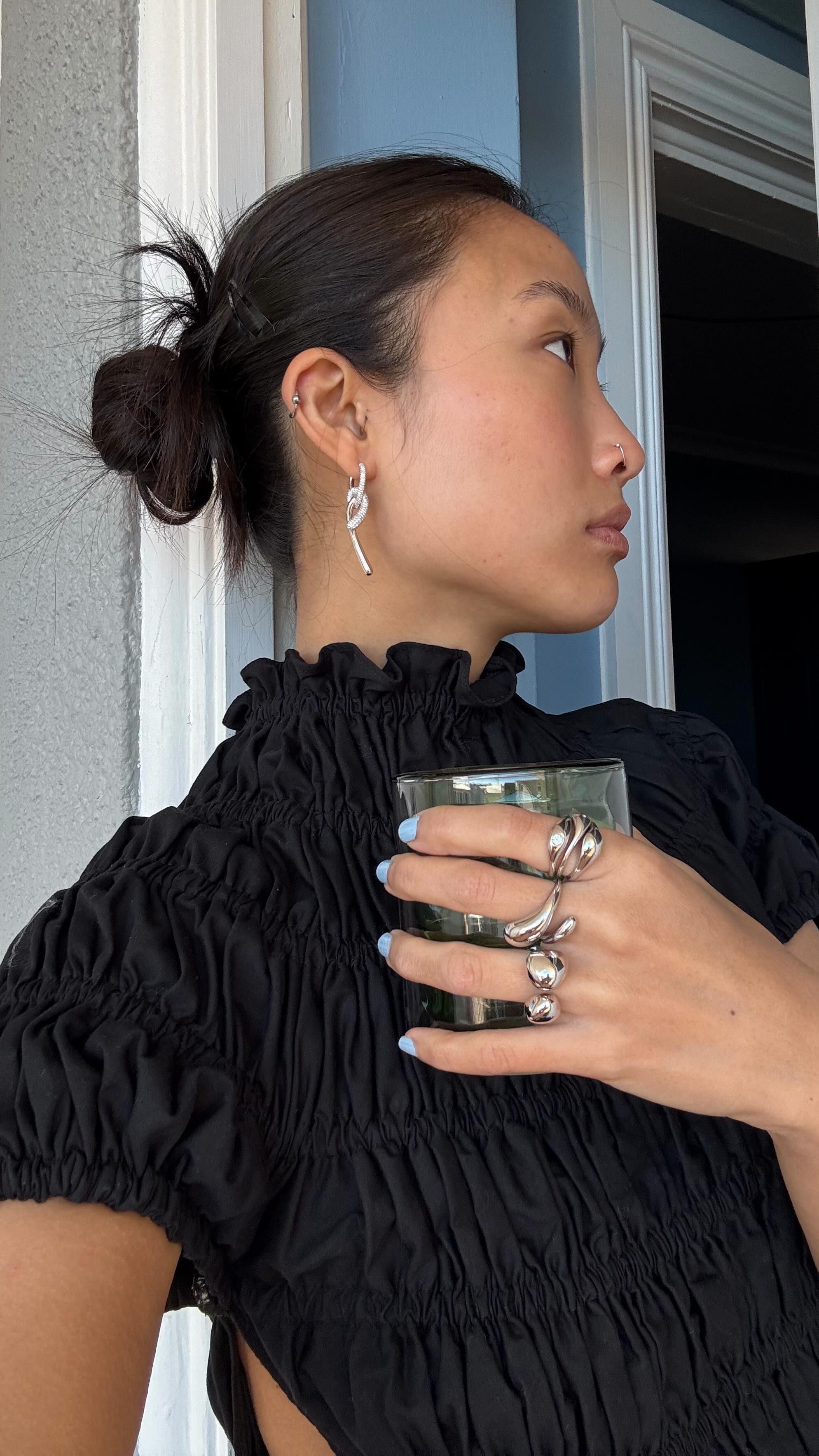 Instagram post by @_nickihan for PDPAOLA. Caption reads: Jewellery game strong thanks to @pdpaola_jewelry....