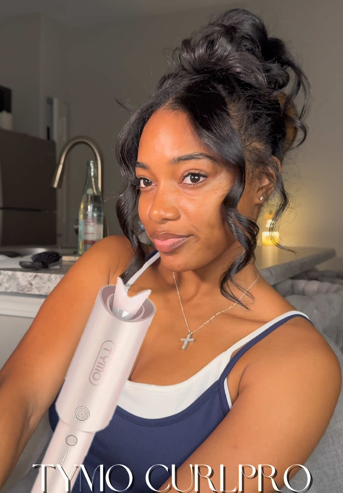 TikTok post by @butimbria for TYMO Beauty. Caption reads: [...] and need a quick updo 💙 @TYMO BEAUTY US....