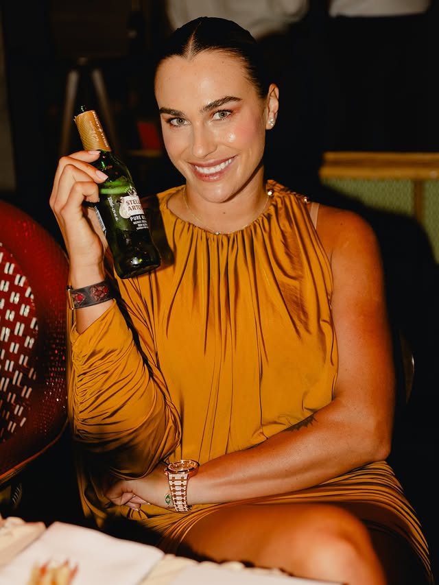 Instagram post by @arynasabalenka for Stella Artois. Caption reads: A golden evening calls for a @stellaartoisbrasil....