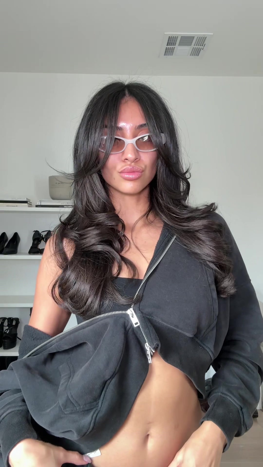 TikTok post by @theedanihernandez for DEZI. Caption reads: code: DANI 10% off @DEZI EYEWEAR #eyewearfashion....
