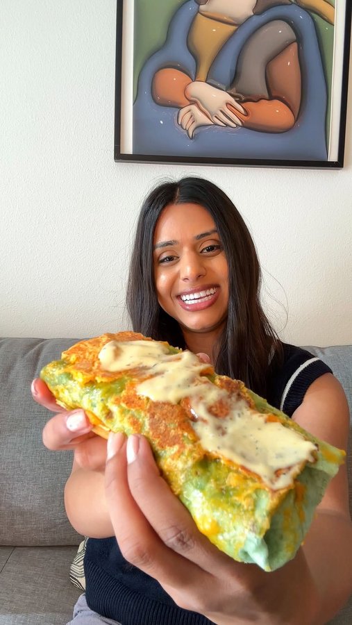 Instagram post by @itsromab for Follow Your Heart. Caption reads: #ad Plant-Based Cheese Crusted Burrito with Spicy....