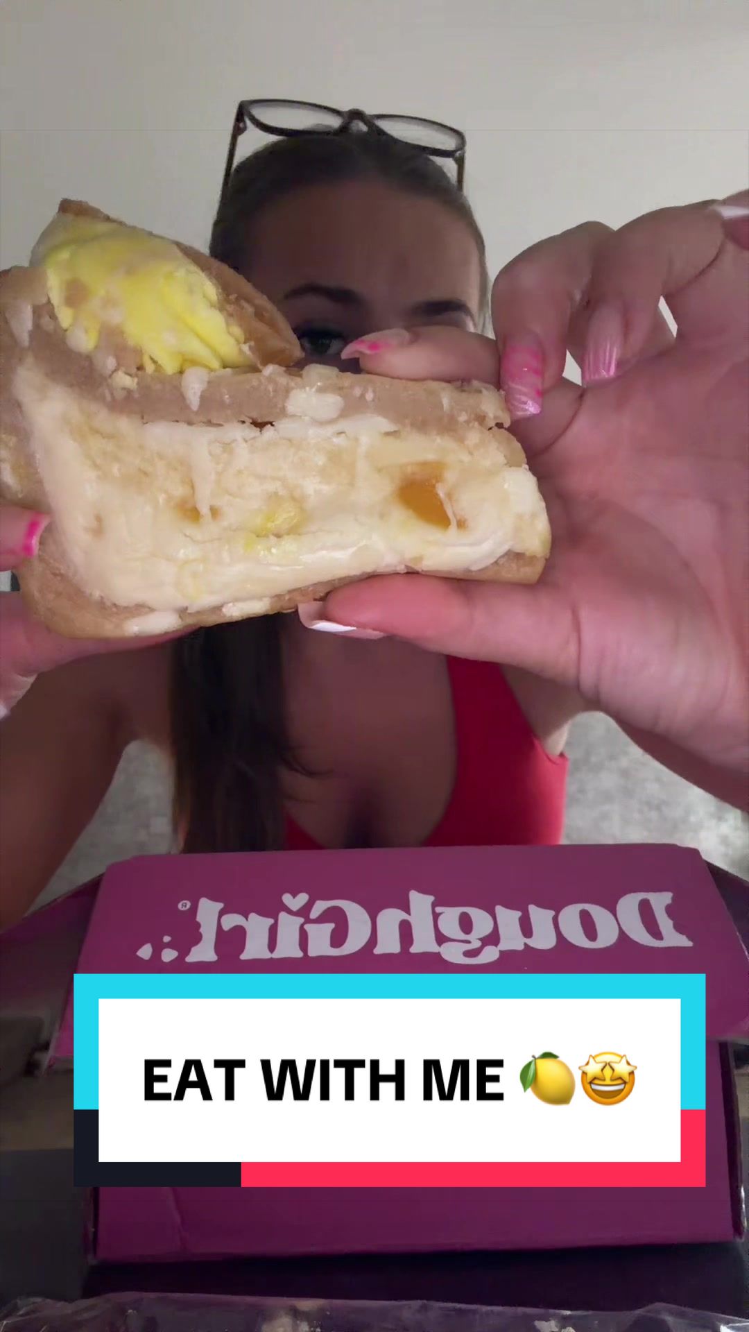 TikTok post by @paigelbriggs for DoughGirl. Caption reads: @DoughGirl 🍋😍#eatwithme #cake #tiktokshop [...].