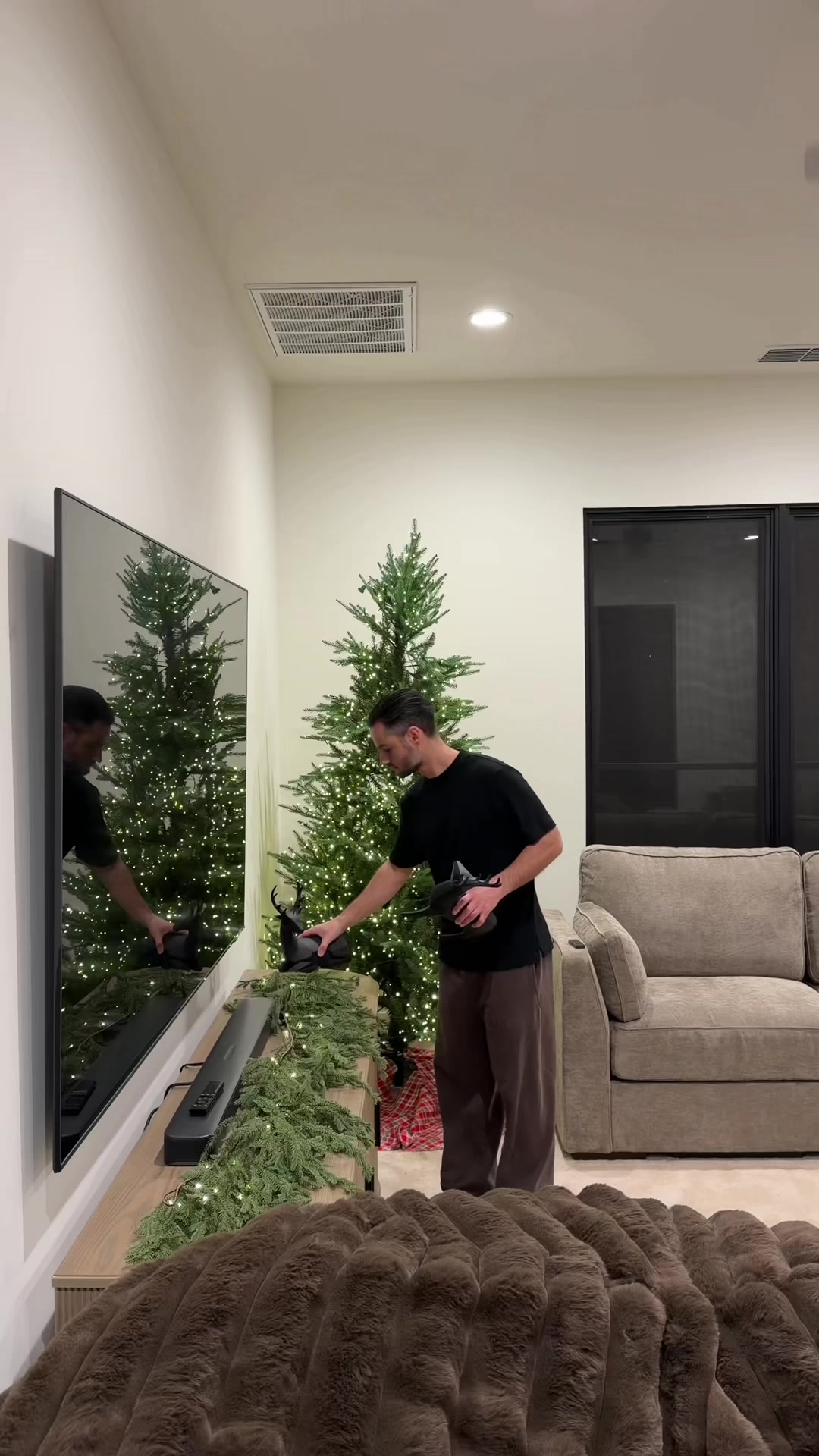 TikTok post by @everythingdad for Lovesac. Caption reads: #lovesacpartner The holidays can get loud and....