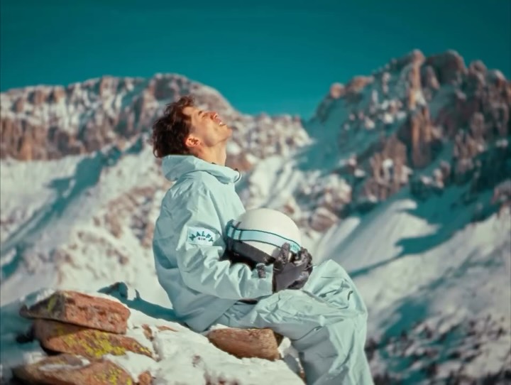 Instagram post by @diegolazzari_ for MALFY Gin. Caption reads: [...] Snowboard on top of the dolomites with....