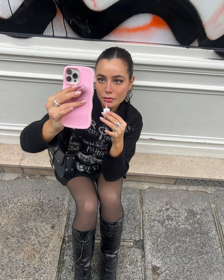 Instagram post by @gretaluxx for Holdit. Caption reads: in my pink era @holditbrand.