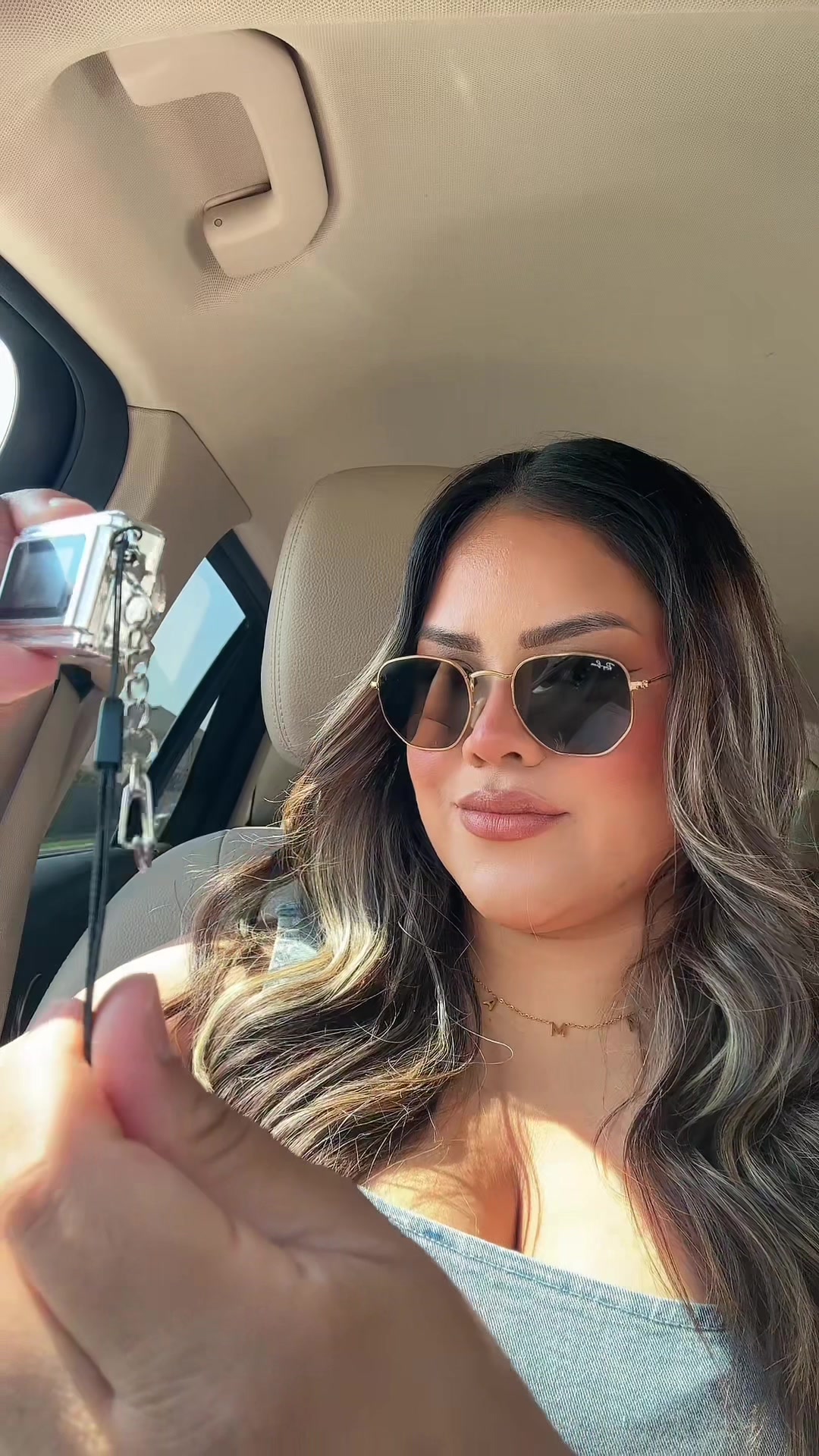 TikTok post by @selenava512 for Fitpolo. Caption reads: The cutest camera ever 🤭🖤 @HOTU US #hotu....