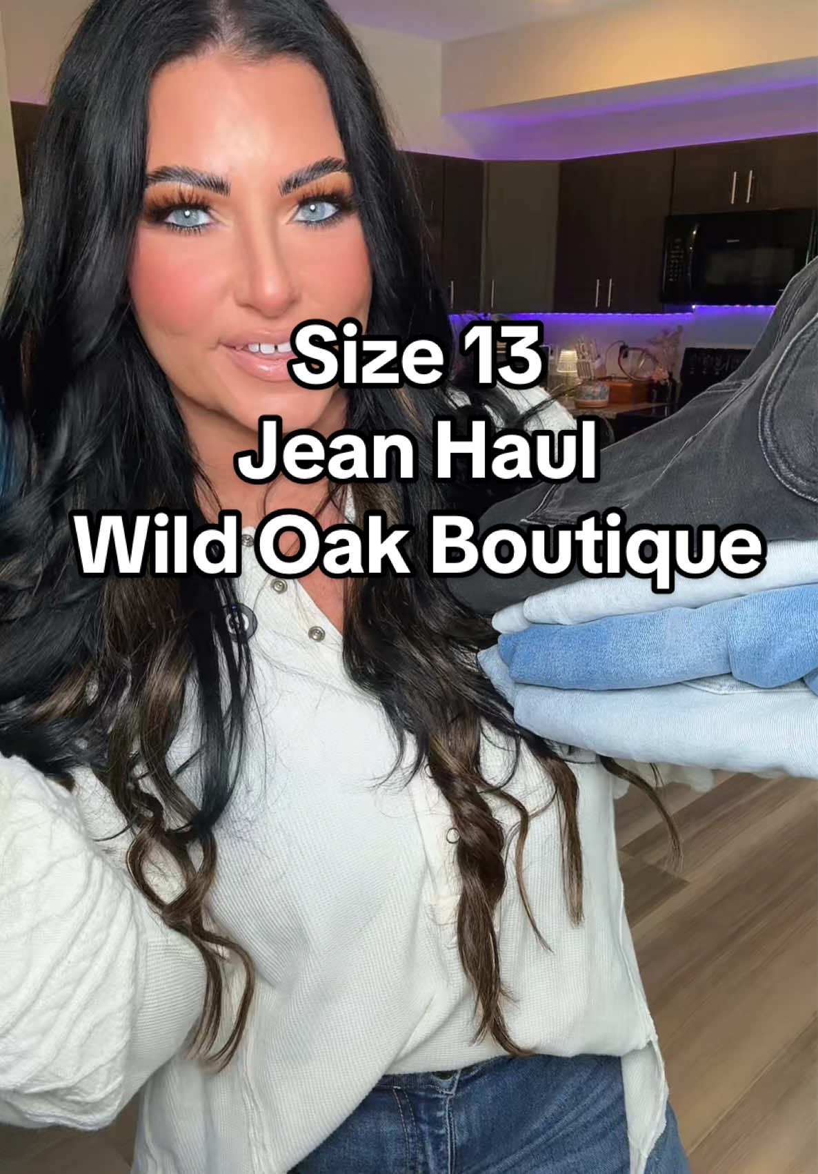 TikTok post by @ambergoobs for Wild Oak Boutique. Caption reads: [...] me some distress denim 🩷💕 @Wild Oak....