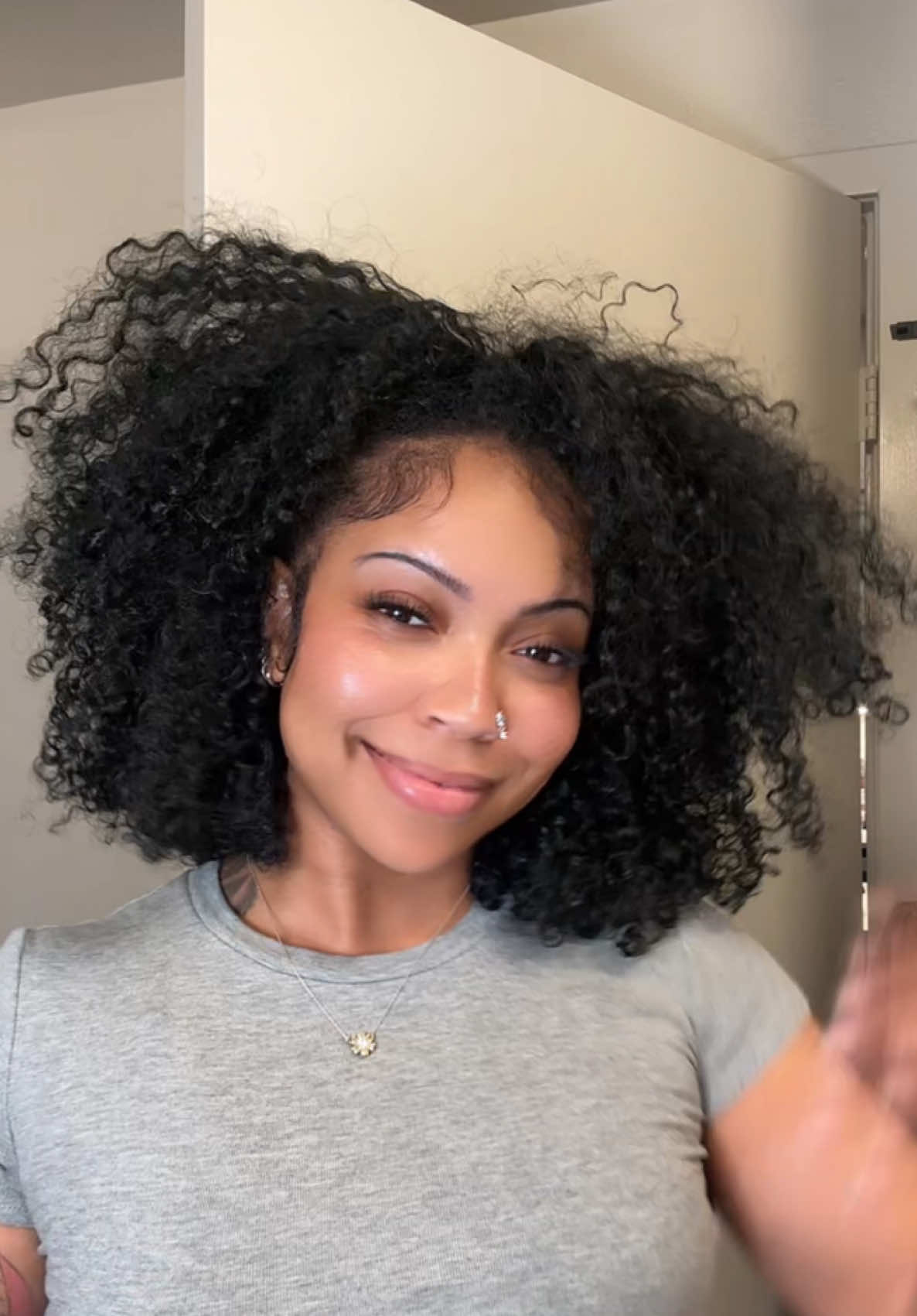 TikTok post by @slllaine for iseehair. Caption reads: 😭😍This is the kinky curly half wig from....