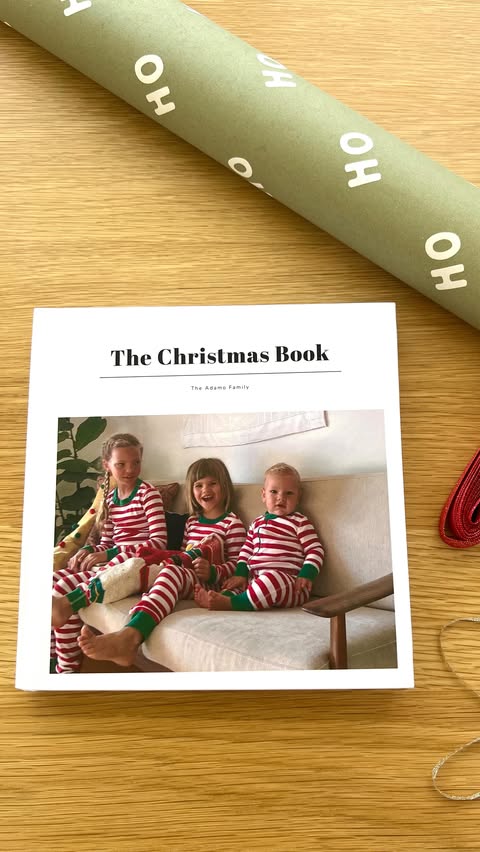 Instagram post by @courtneyadamo for Once Upon. Caption reads: [...] a Christmas photo book using the....