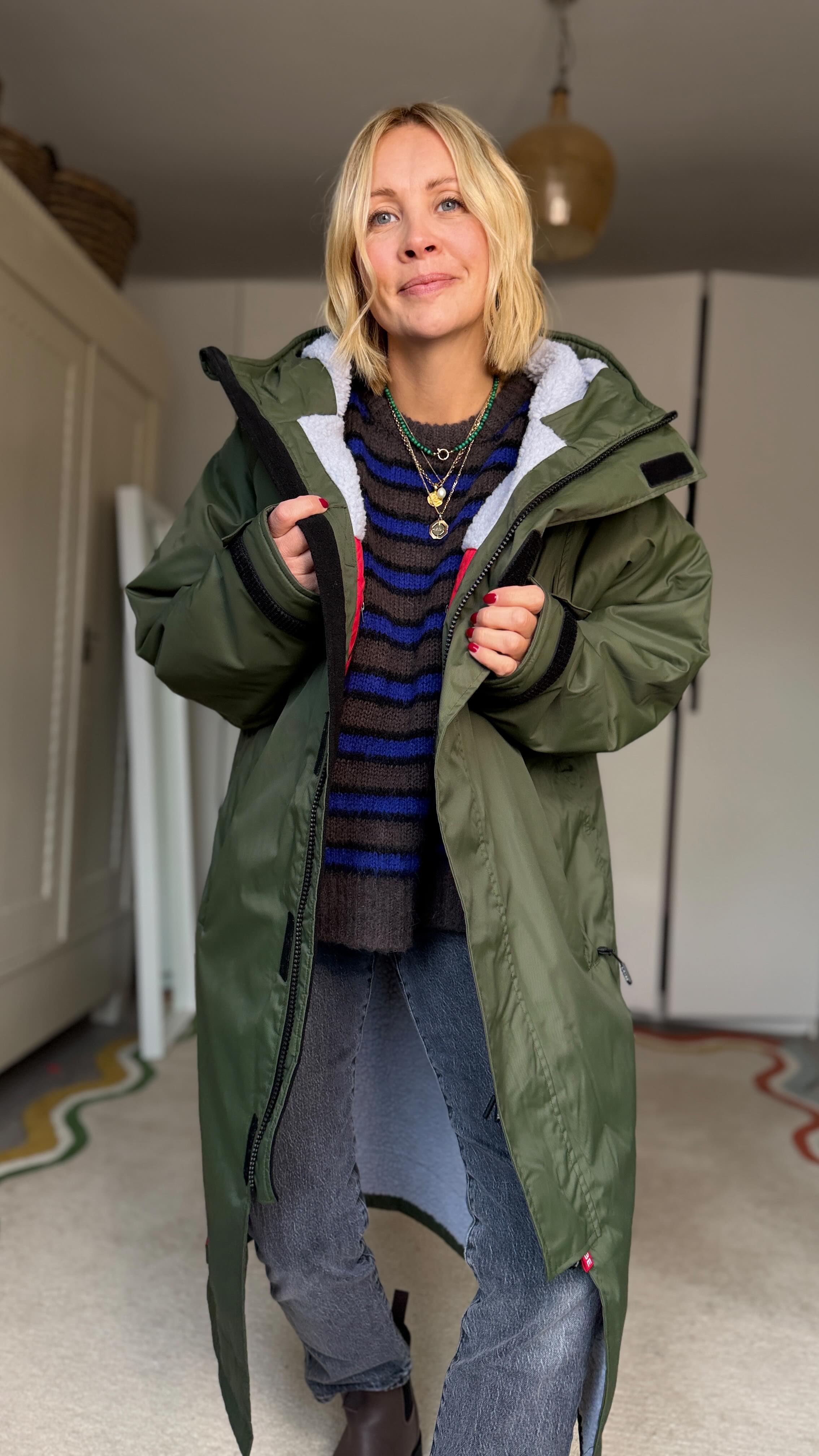 Instagram post by @ashley.dainty for Merry People. Caption reads: Ready for the rain, wind and cold with this....