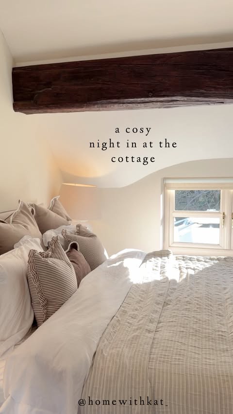 Instagram post by @homewithkat_ for Febreze. Caption reads: A cosy evening with me in the cottage 🍂🧦 we....