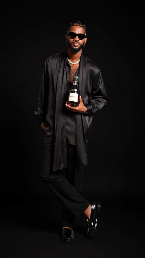 Instagram post by @jimmieakinsola for Hennessy. Caption reads: [...] sign another one year extension with....
